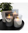 LED Bloklys sæt i røgfarvet glas Ø7,5cm, 3 stk, flammeeffekt - Inkl. fjernbetjening og timer, 10/12,5/15cm høj, ægte stearin